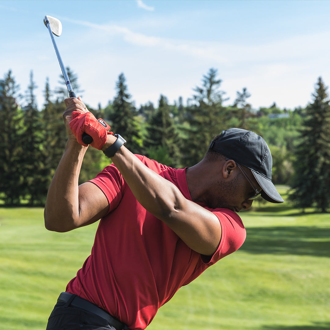 coral-red-Cabretta-Leather-Gloves-while-golfing